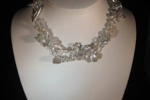 Heather/$144.- Double strand of textured large and small keishi pearls with faceted crystal quartz and a brushed sterling silver heart toggle.  This necklace will definetly enhance the neckline of any bride-18
