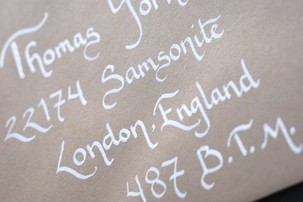 Outer Envelope in white calligraphy font