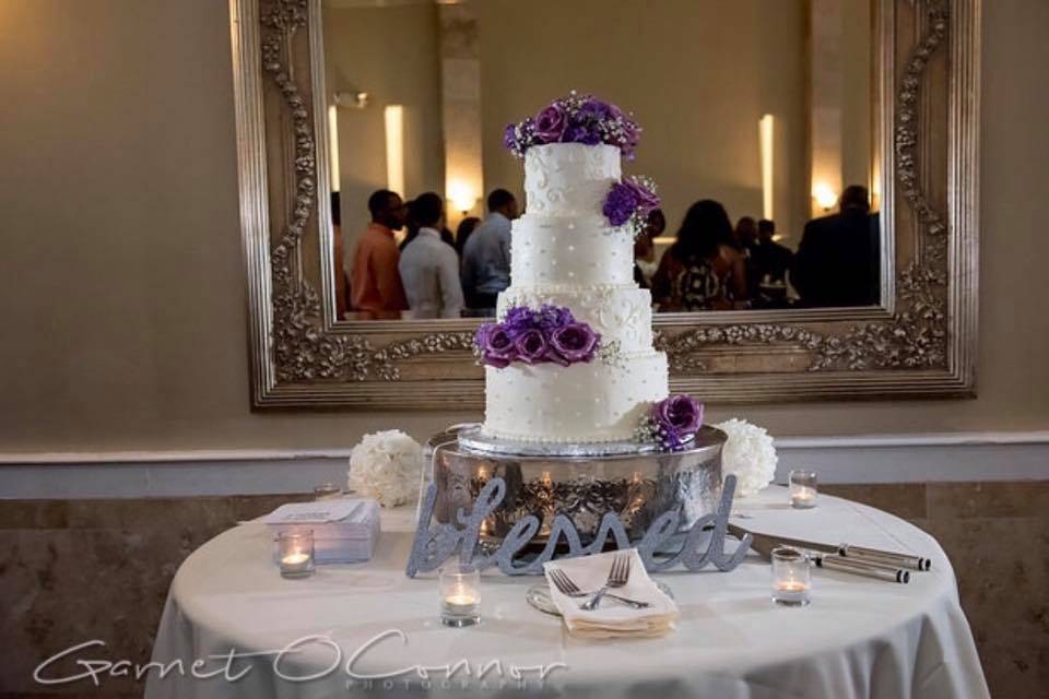 Wedding cake with purple flower