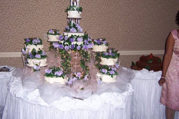 11 layer fully lit cake with fountain underneath.