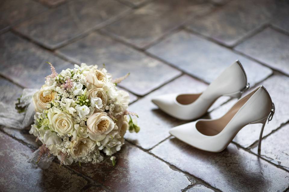 Bouquet and bridal shoes