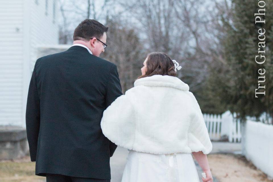 Couple leisurely walk hand in hand​