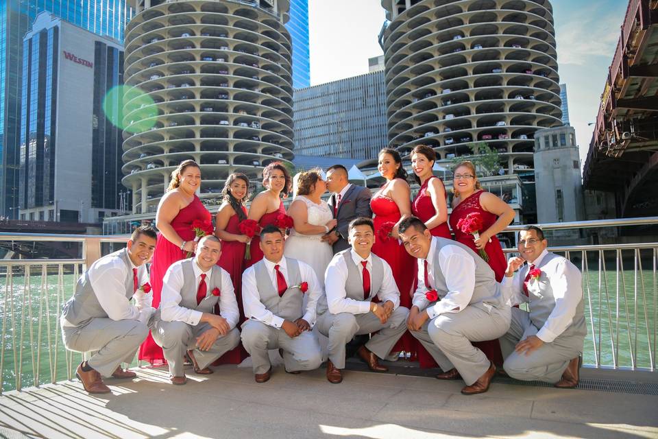 The couple with the bridesmaids and groomsmen