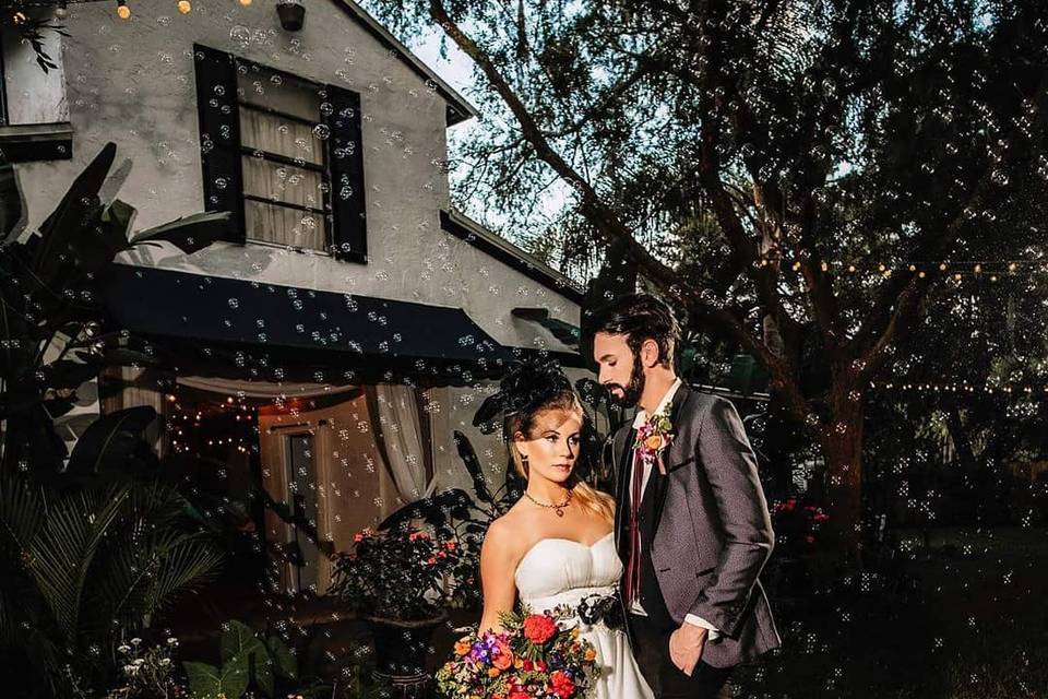 Bride with her groom outside the venue