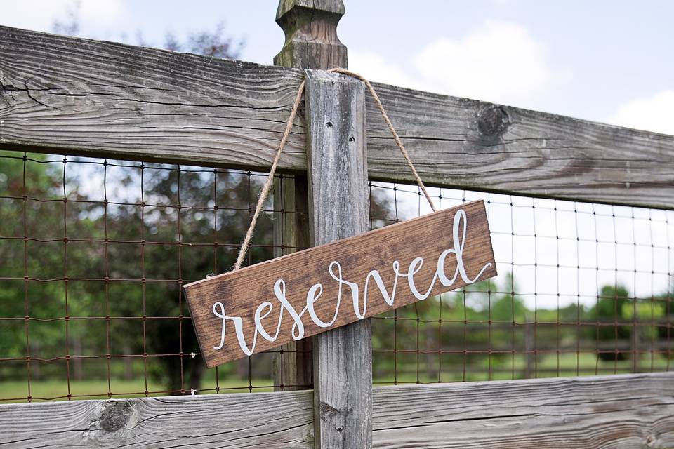 Hanging reserved sign made to save rows/seats for you family members for during the ceremony. These can be made in any stain color and and paint color that you wish.