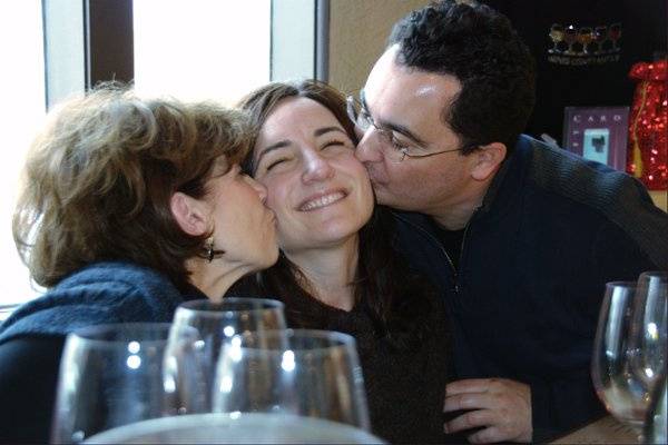 Groom and Mother of Bride wine tasting and smooching Bride to be...