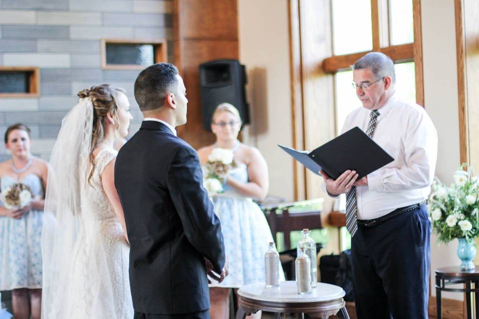 Officiant reading  the script