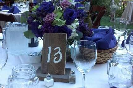 Beautiful roses, lisianthus, hydrangea and more make a simple yet stunning centerpiece.