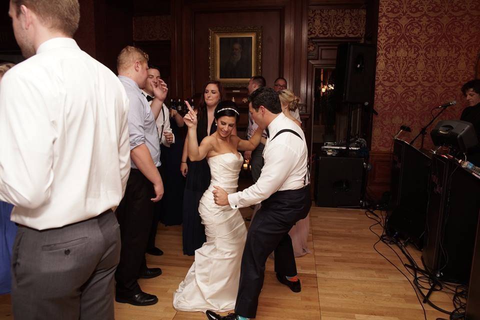 Newlyweds dancing with each other