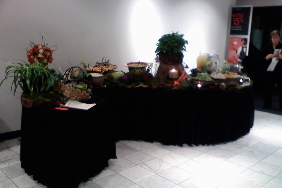 Appetizer display on a serpentine table.