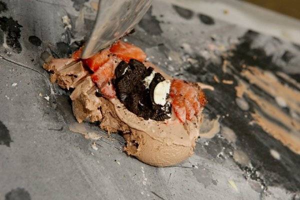 Chocolate Ice Cream with Strawberries and Oreos getting mixed in!