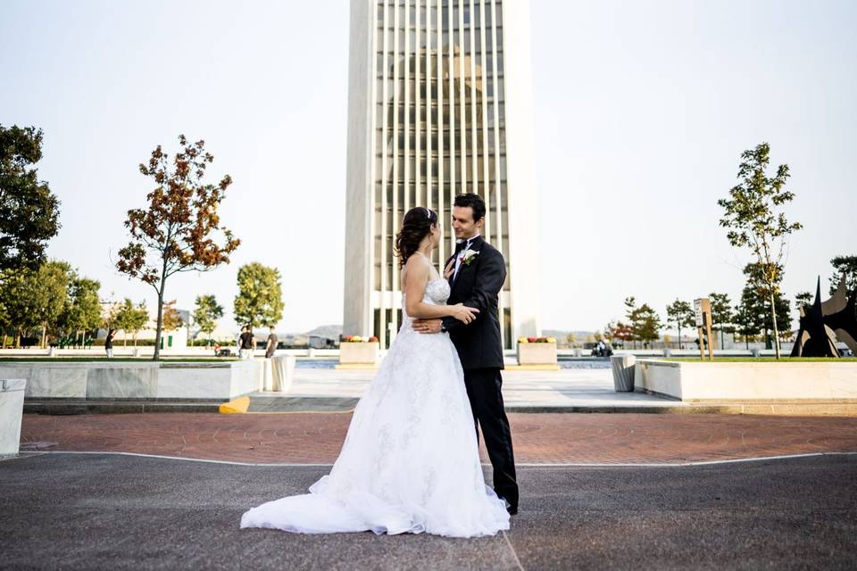 Couple by tall building - Spencer Heath Photography