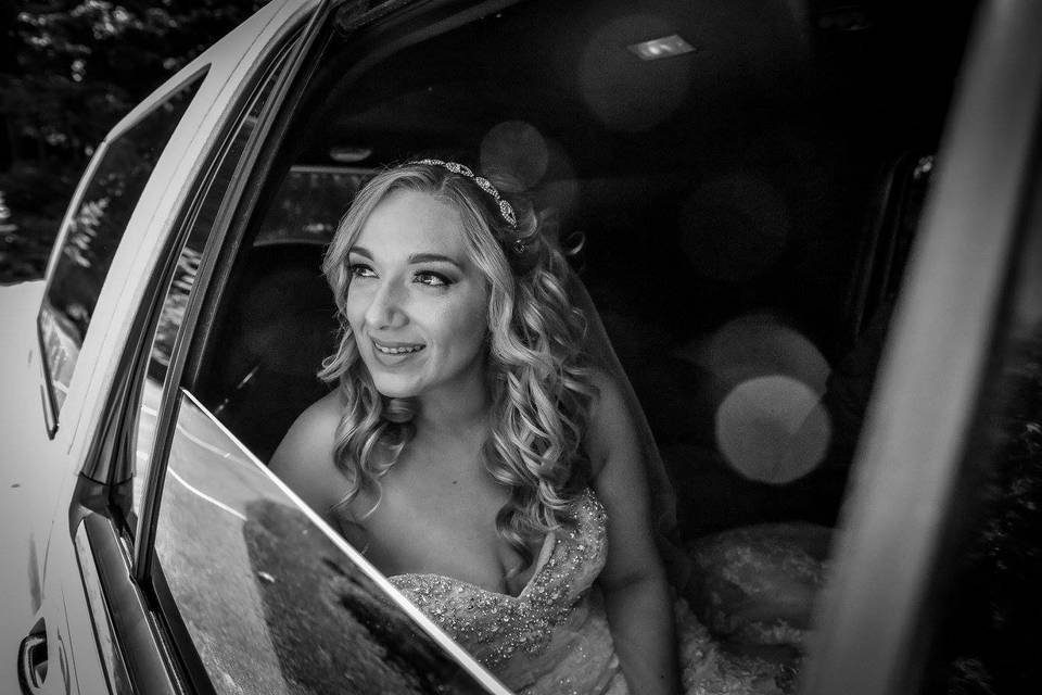 Bride in bridal car