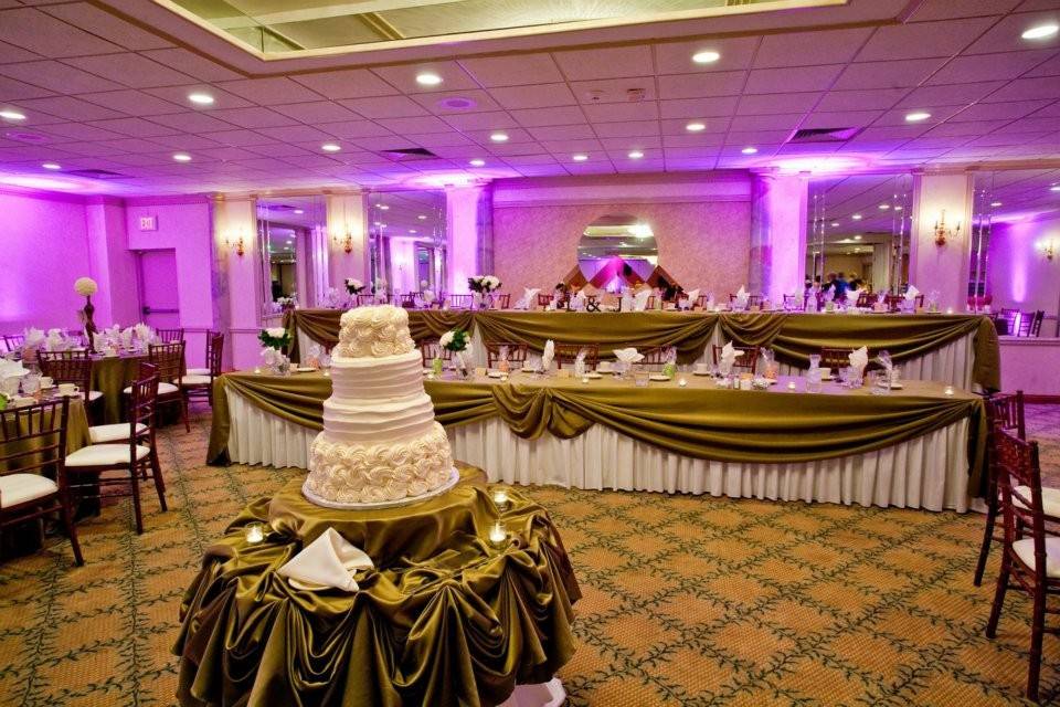 Head table and wedding cake display