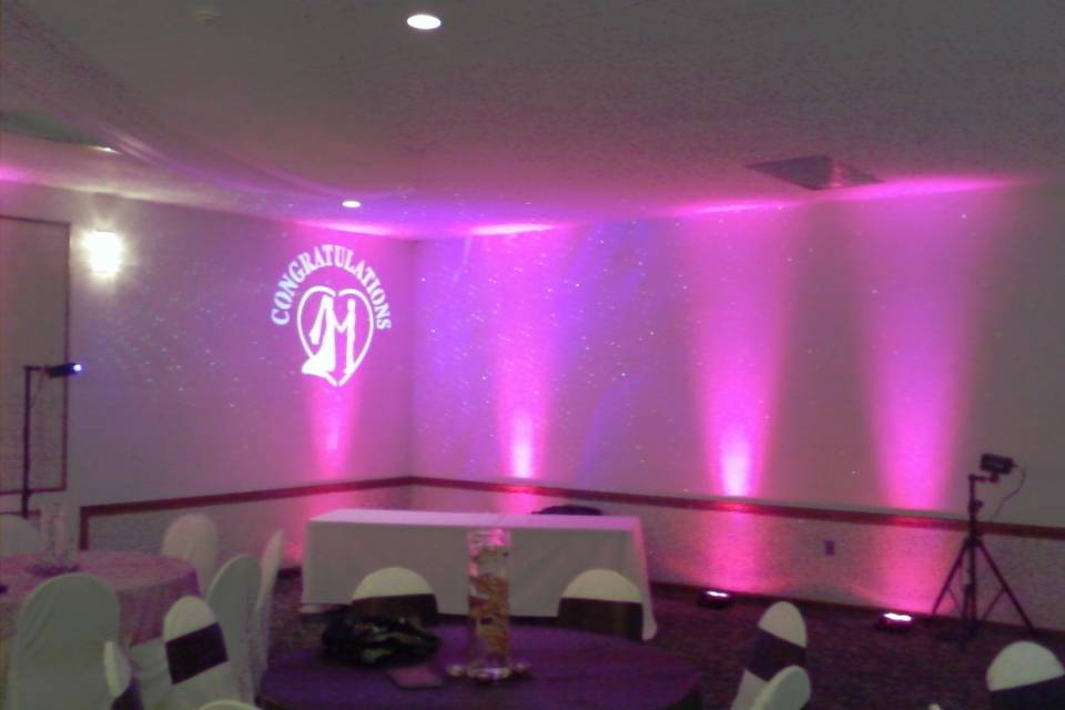 Pink up-lights with monogram