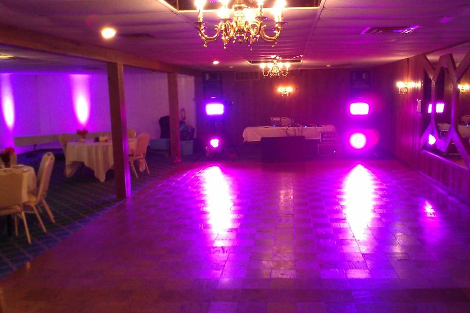 Michaud's in strongsville with purple up-lights and a dance floor wash.