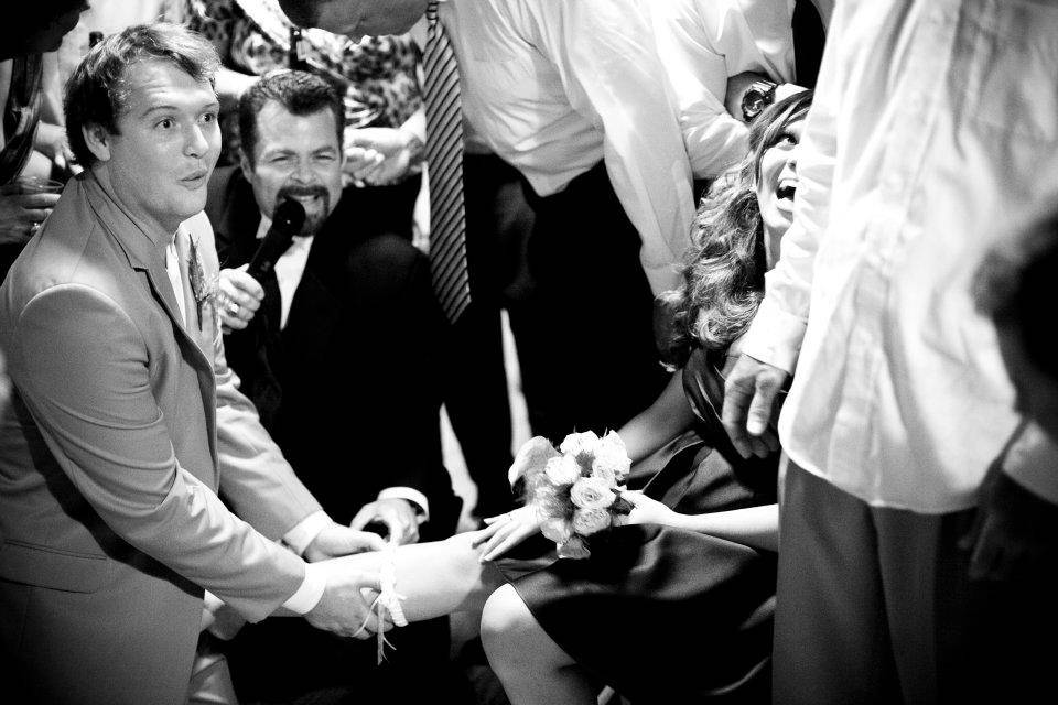 DJ / MC offering a story during the cake cutting and toasts. This groom loves chocolate milk. So, the dj surprised him with his own ice cold bottle for the toast