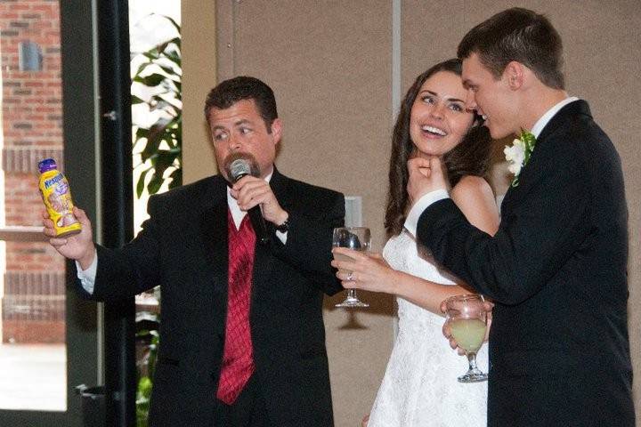 DJ / MC offering a story during the cake cutting and toasts. This groom loves chocolate milk. So, the dj surprised him with his own ice cold bottle for the toast