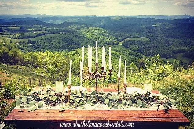 Wooden table setup with candles