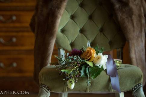 Green chair with flowers