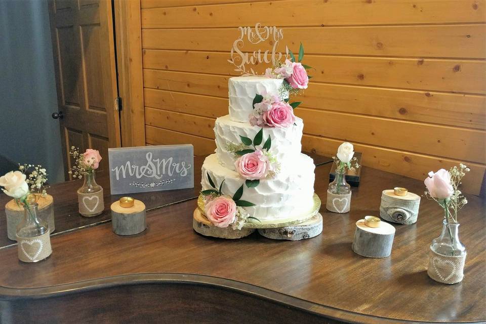 Wedding cake with pink flowers