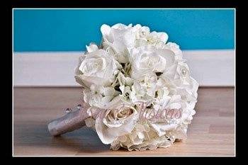 This is a white rose and hydrangea bouquet. This is an elegant bouquet!