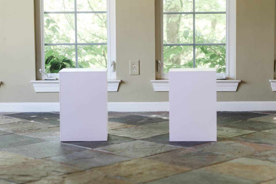 Modern white urn pedestals