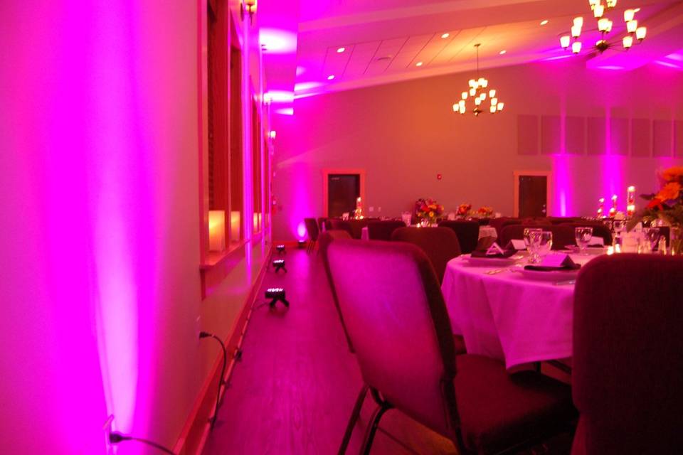 All Sounds Unlimited hot pink up lighting and decor at the Urbana Conference Center in Urbana, Ohio for a wedding