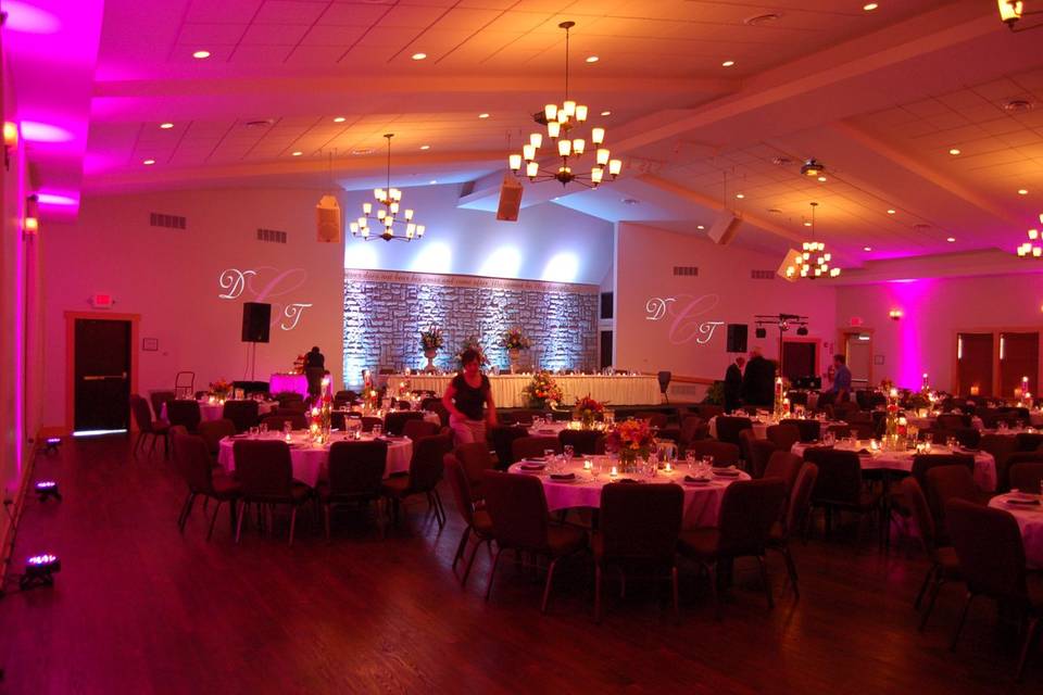 All Sounds Unlimited hot pink up lighting and decor at the Urbana Conference Center in Urbana, Ohio for a wedding