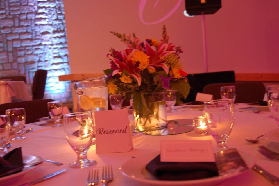 All Sounds Unlimited cake table decor and monogram at the Urbana Conference Center in Urbana, Ohio for a wedding