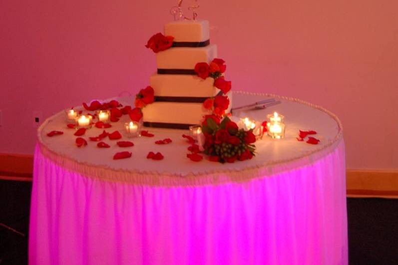All Sounds Unlimited cake table decor and monogram at the Urbana Conference Center in Urbana, Ohio for a wedding