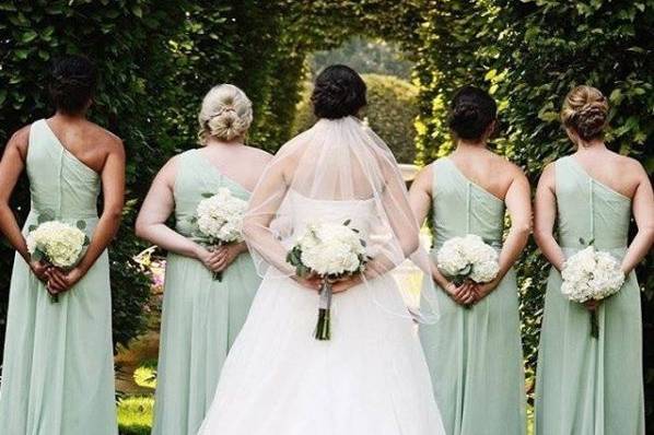 Bride, bridesmaids, and bouquets