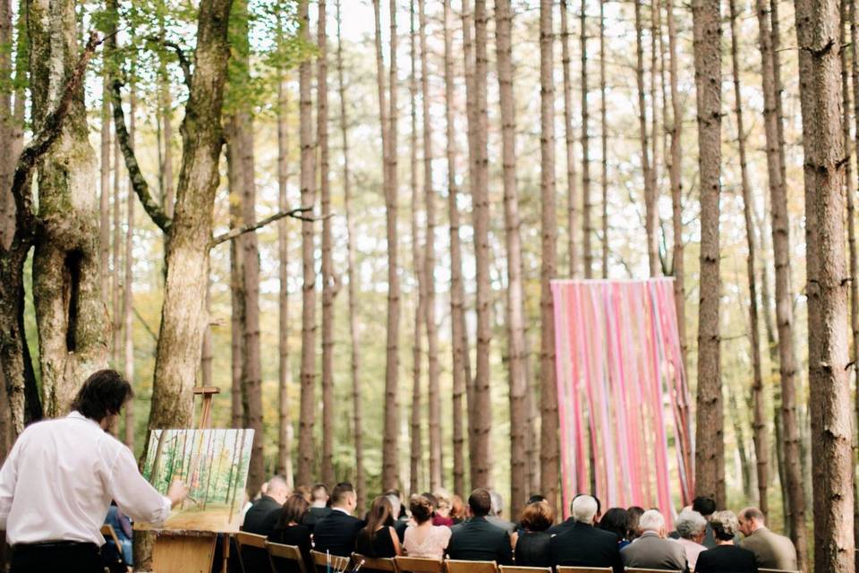 Live painting of the wedding in the woods
