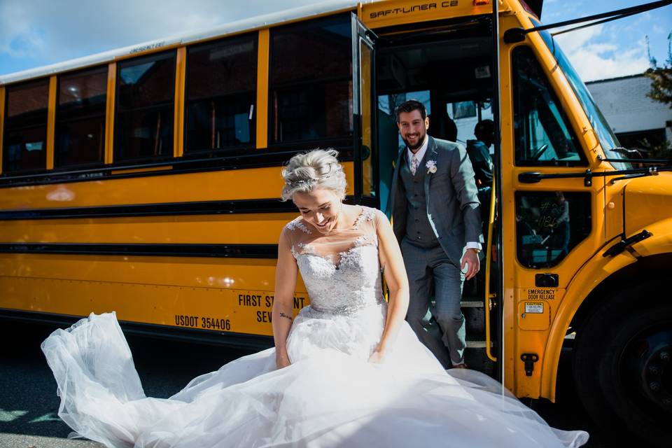 Newlyweds surrounded by skaters