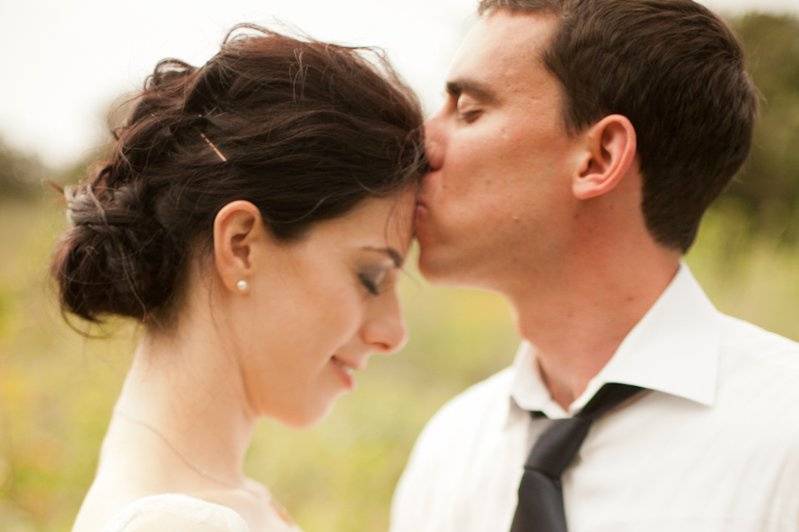 Couple's forehead kiss