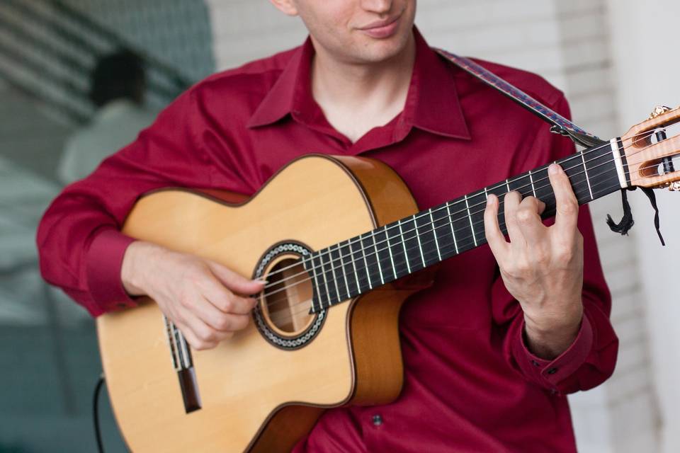 Jim Perona on his guitar