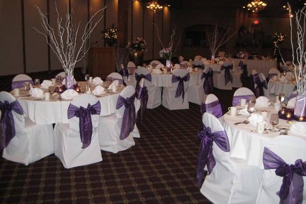 White Chair Covers with Plum Organza Sashes