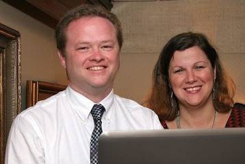 Ron and Beth Swain of RCBAudio DJ Services.  Charleston Harbor cruise wedding.