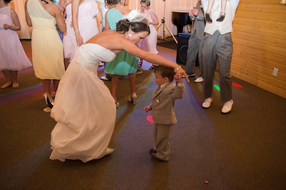 The bride and the little kid dancing