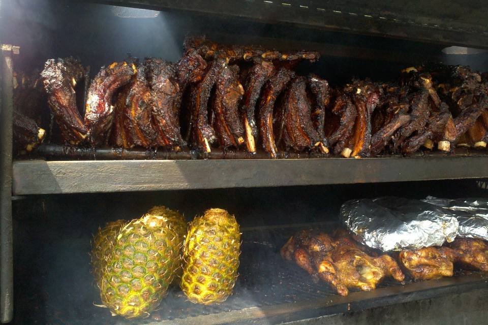 Beef ribs, whole chickens and pinapples