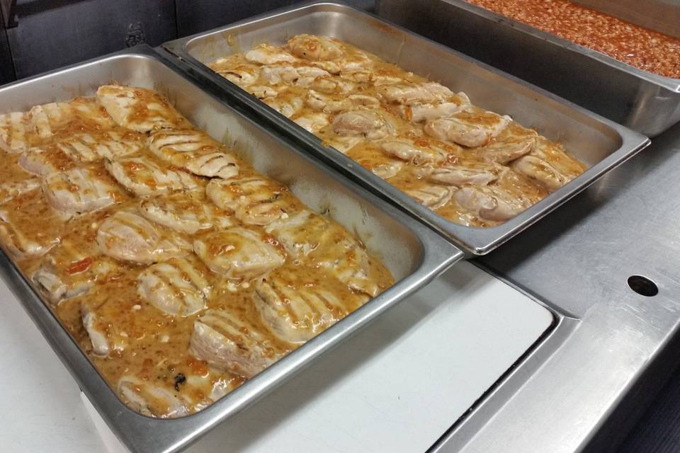 Apricot glazed grilled chicken breast ready to be finished in the oven