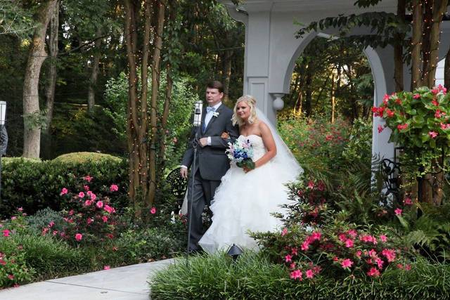 Couple walking through arch