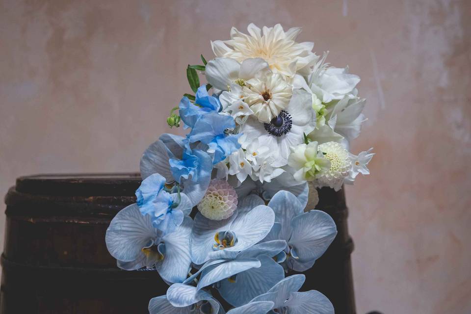 Vintage bride holding flowers