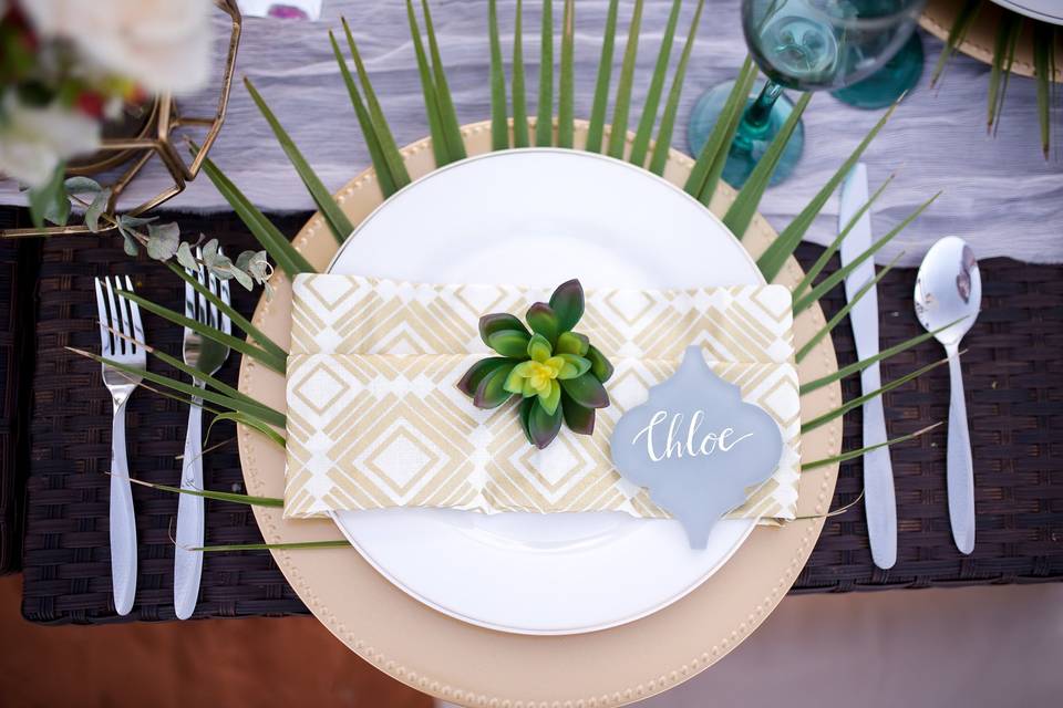 Place settings are a great way to make a statement that guests will remember.  Photo by Taylor Marie Photography