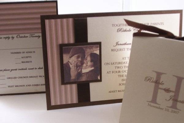 Elegant pink and brown stripes accented with a dark chocolate velvet ribbon.  The couple chose to add a picture on the invitation and a monogram on the program.