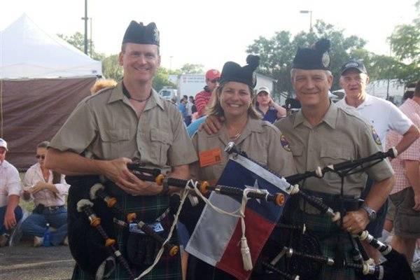 Stephen Holter piping at the Texas Folklife Festival in San Antonio with cousin Margie and her husband E.W.