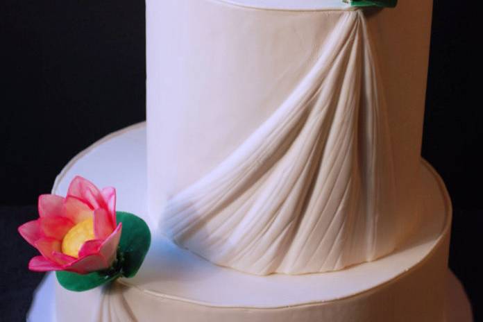 White wedding cake with flowers