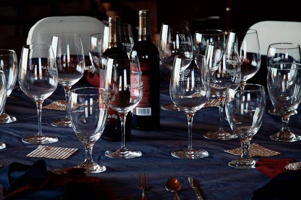 A table setting at a Flying Leap wedding is expertly done, with 22oz Bordeaux stemware and our selection of wines, the moment is truly first-class and extraordinary