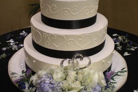 Deep purple and black cake accents