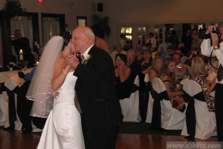 The bride dancing with her father